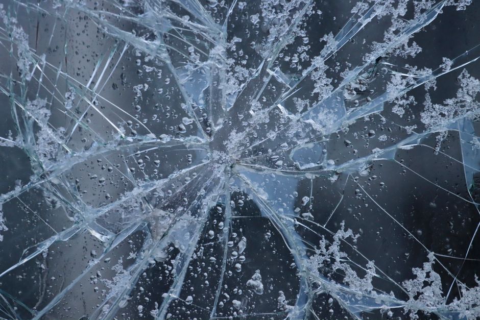 Cracked car windshield requiring replacement